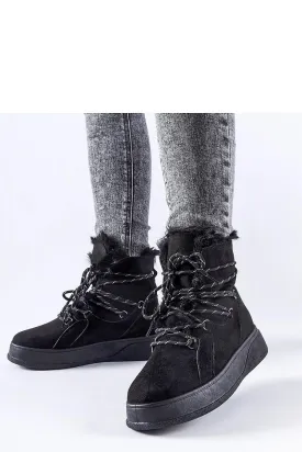 Black snow boots on the Rancourt platform